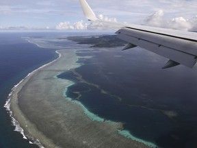 The aerial photo shows Pohnpei International Airport in Kolonia, Federated States of Micronesia, on Aug. 5, 2019. Micronesia has likely become the final nation in the world with a population of more than 100,000 to experience an outbreak of COVID-19. On Tuesday, July 19, 2022, the government announced it had become aware of multiple cases across two of the nation's four states.