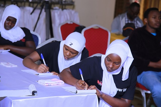 Three women participate in a Girl Power Talk Forum