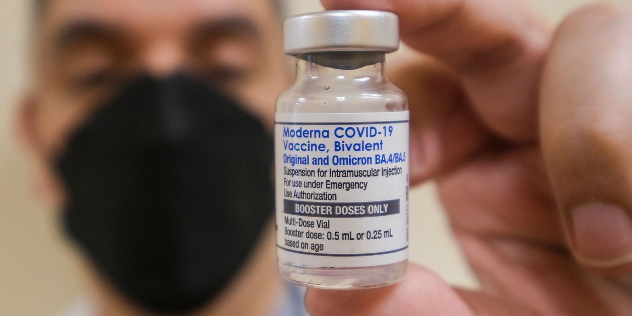 Arkansas governor says he supports the science behind COVID-19 vaccines, as daily U.S. cases hold above 65,000