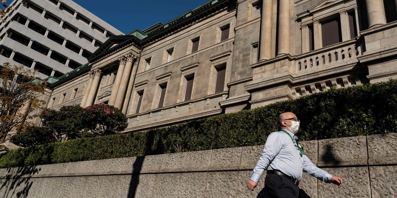 Japan financial stocks surge after BOJ loosens yield control