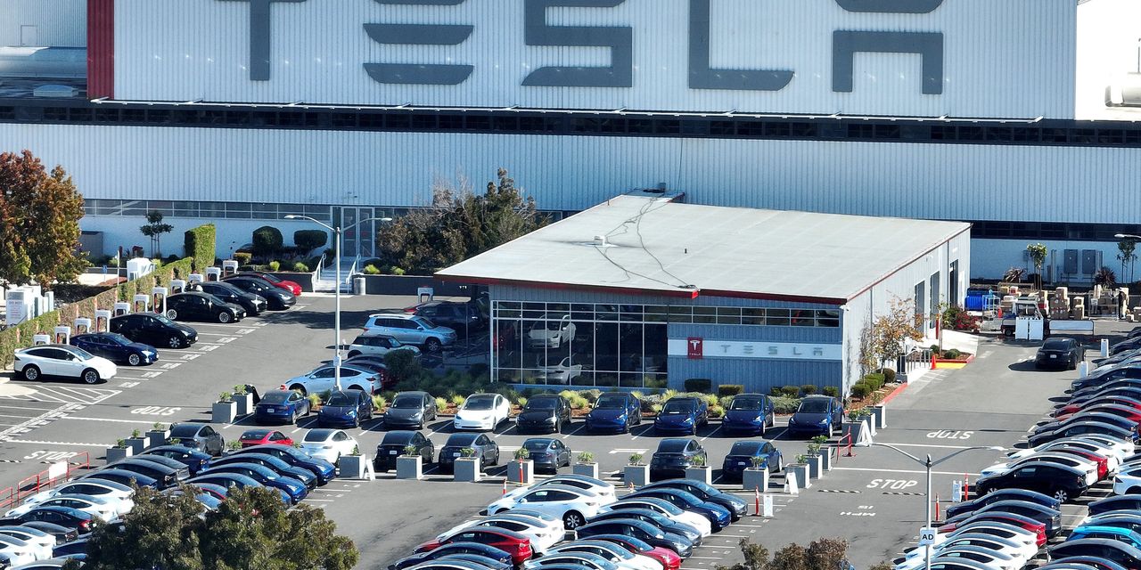 Tesla stock ends at fresh two-year low, bucking broader market trend