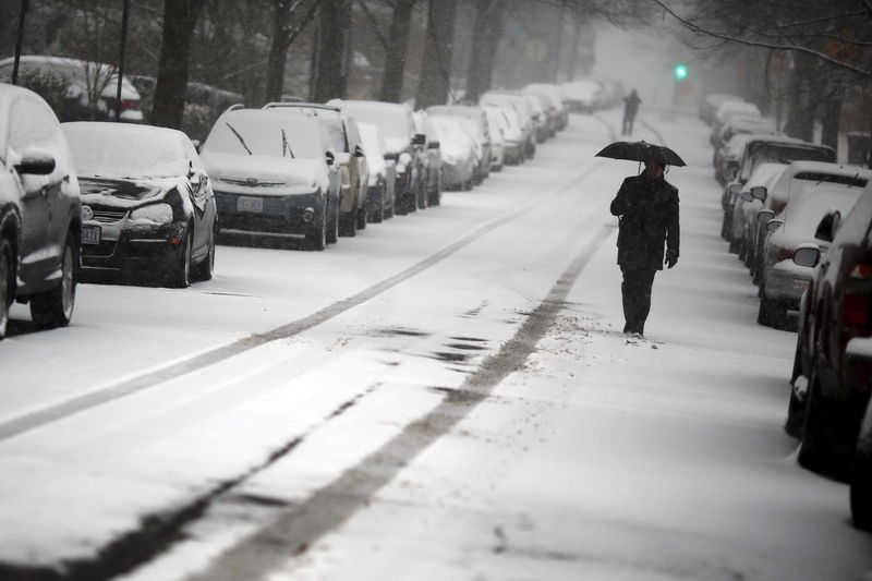 Winter storm pummels north-central U.S. with snow, spawns tornadoes in South